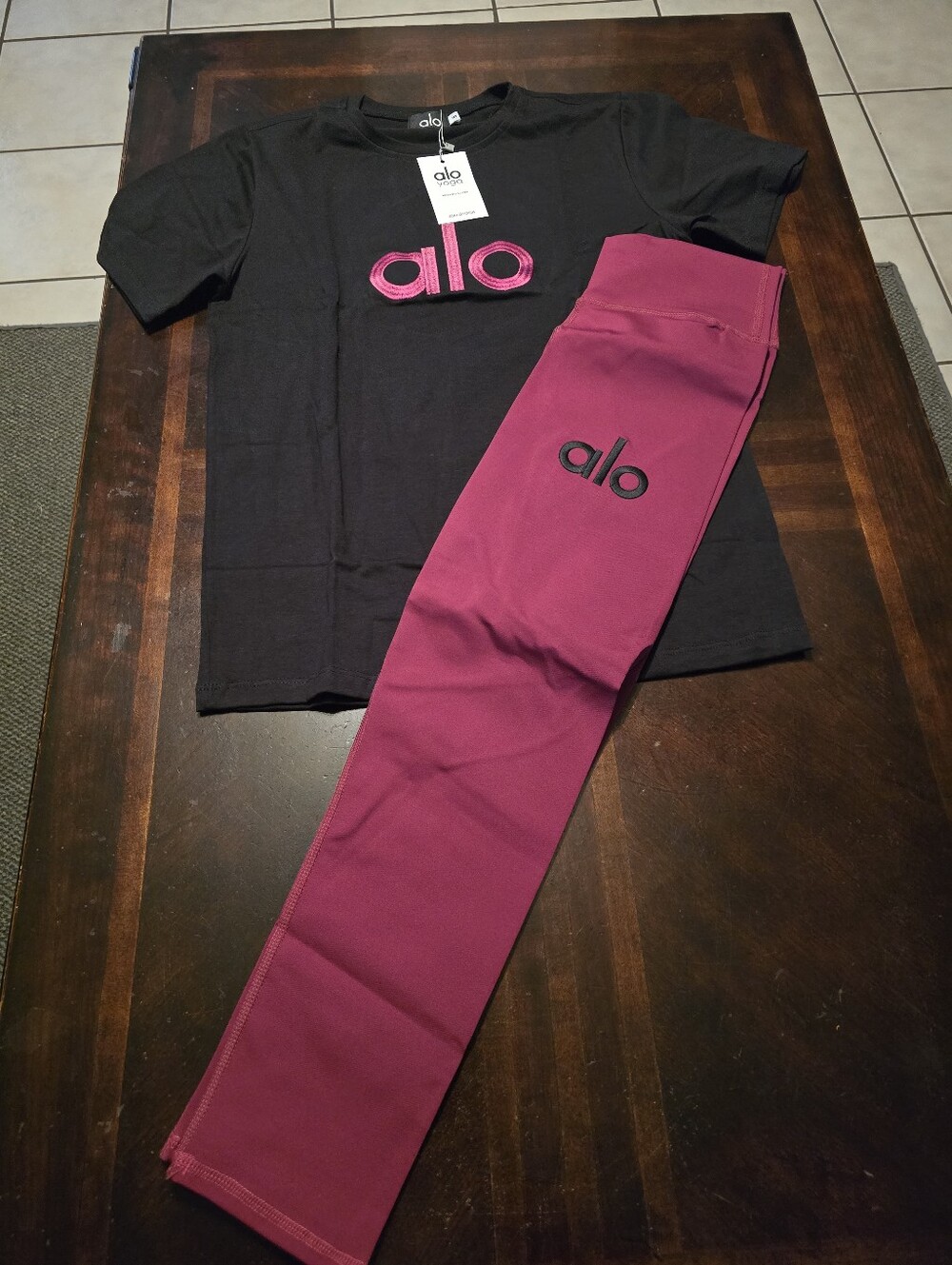 ALO Yoga Black Top with Berry-Magenta Leggings
